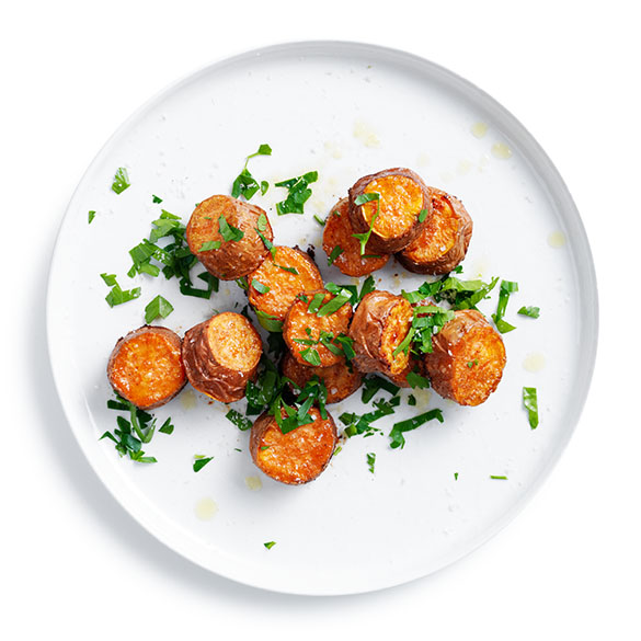 Roast spiced mini gold sweet potato are a tasty snack or side dish the family will enjoy - accompany with chicken or lamb for a complete meal.