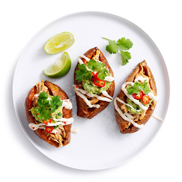 Delicious sweet potato splits with chicken and avocado. An easy to cook and delicious meal idea, great for that midweek dinner. 