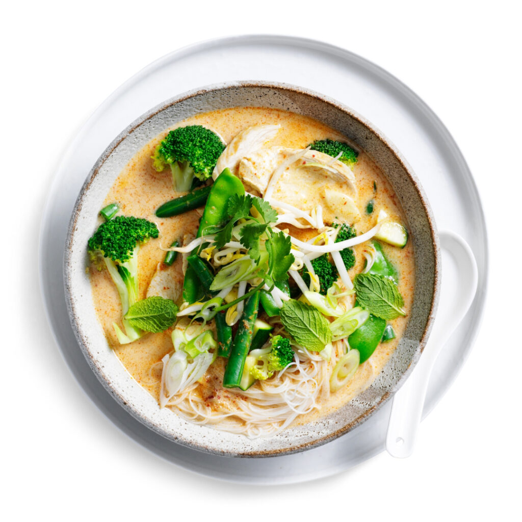 Enjoy the aromatic flavors of Green Vegetable and Chicken Laksa. A wholesome and satisfying meal bursting with freshness.